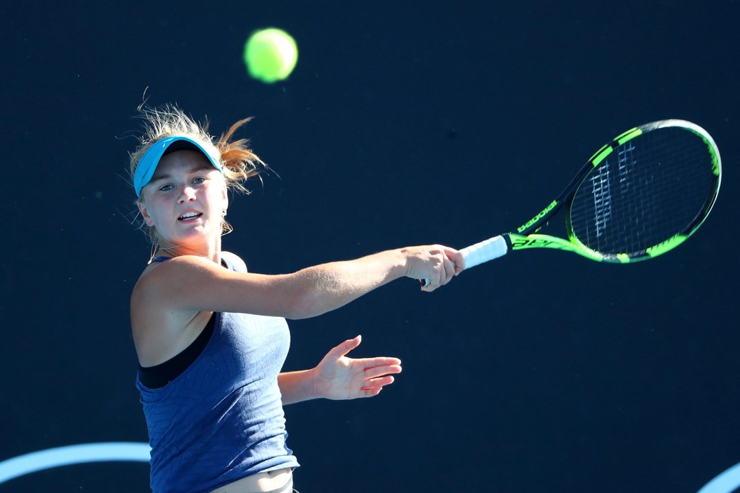 An image of Sweden's Caijsa Hennemann hitting a forehand on court