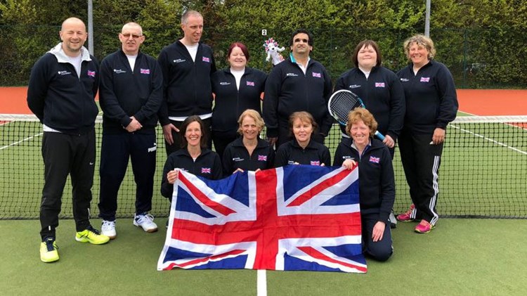 Team GB holding union jack flag