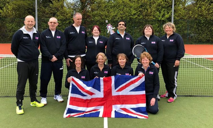 Team GB holding union jack flag