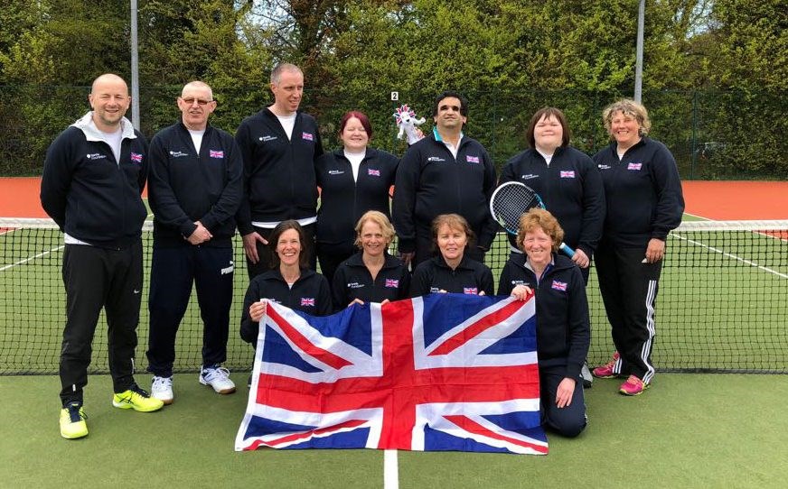 Team GB holding union jack flag