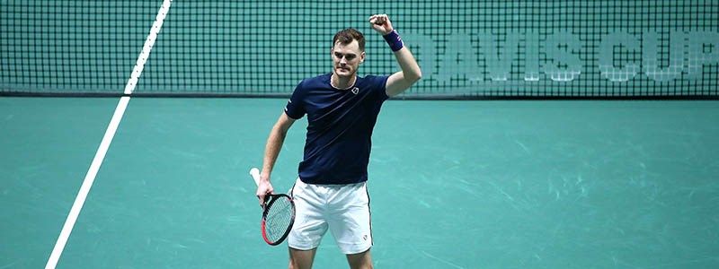 Jamie Murray celebrating on a tennis court at Davis Cup