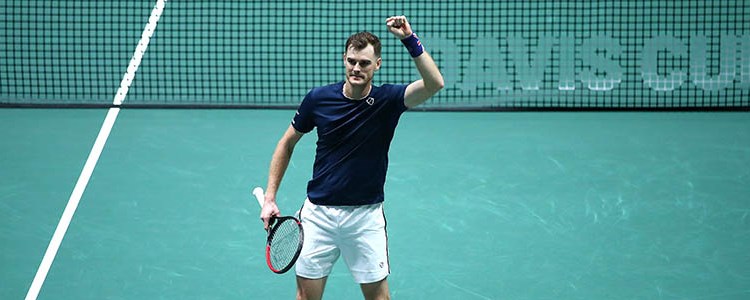 Jamie Murray celebrating on a tennis court at Davis Cup