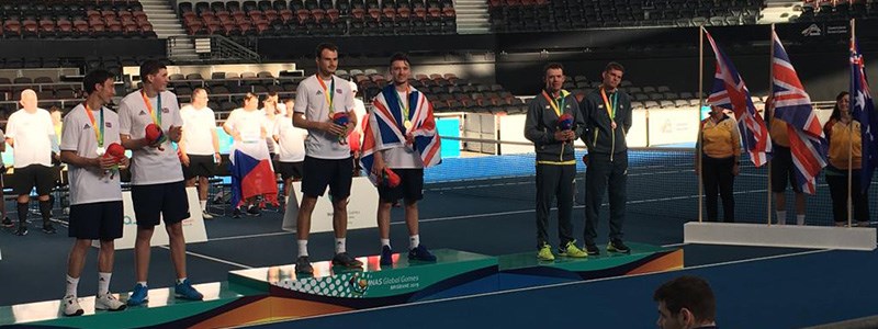 Tennis players at a medal ceremony for the 2019 INAS games