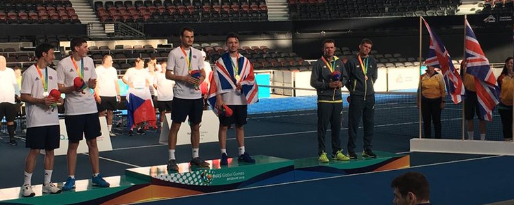 Tennis players at a medal ceremony for the 2019 INAS games