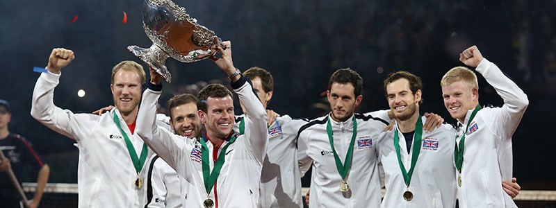 The 2015 Davis Cup team celebrate with their trophy in the air