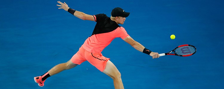 Edmund performing a backhand at the Australian open in 2018