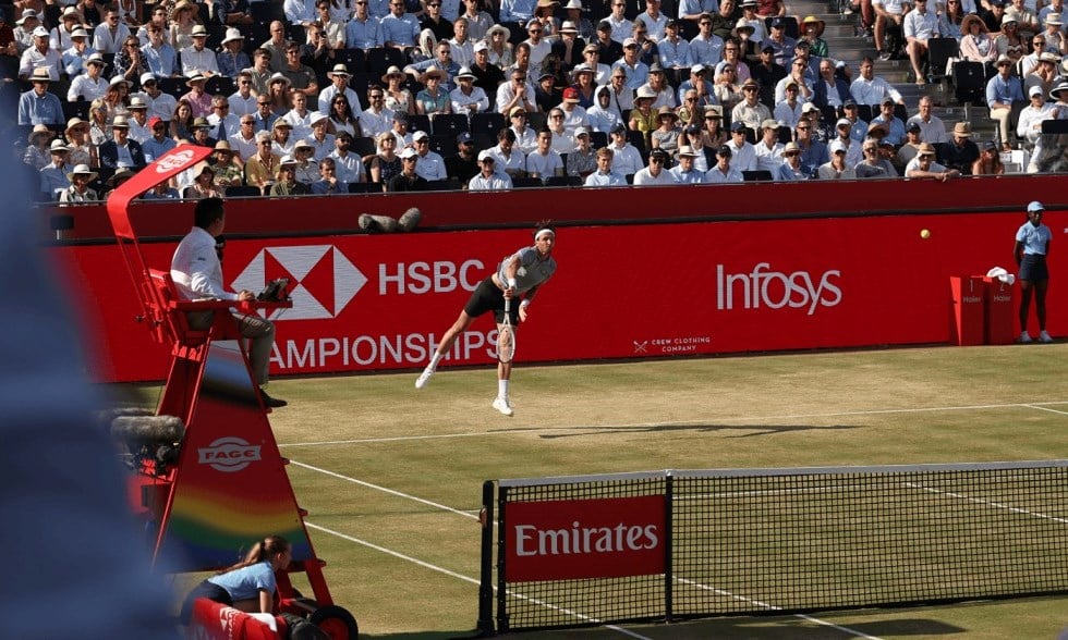 A player hits a serve at the HSBC Championships at The Queen's Club