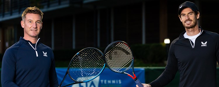 Andy Murray and Scott Lloyd touching rackets at the National Tennis Centre