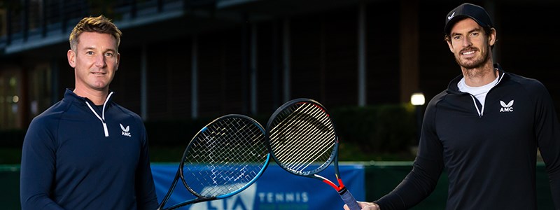 Andy Murray and Scott Lloyd touching rackets at the National Tennis Centre