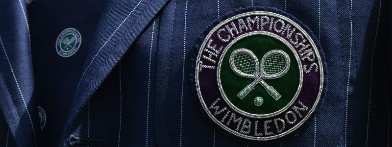 zoomed in image of wimbledon the championships logo on Mike Ross wimbledon suit