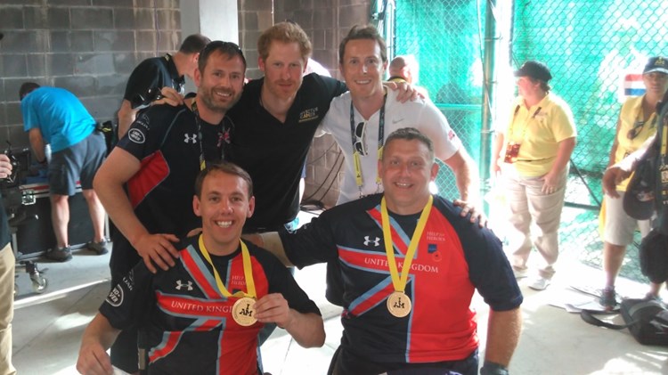 Invictus Games Gold Medalists pose with Prince Harry