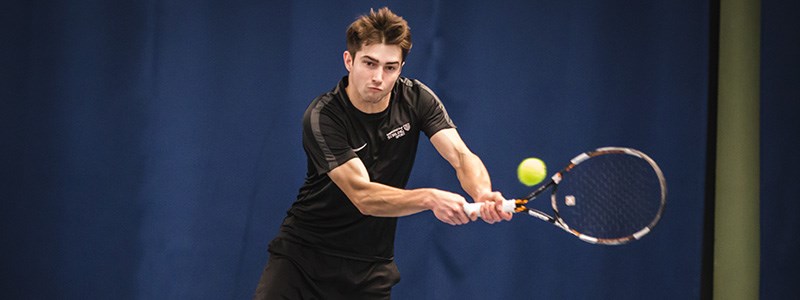 Scott Duncan hitting a backhand