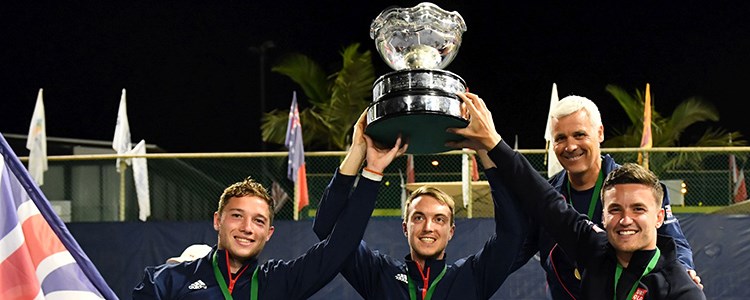 Great Britain's men's wheelchair tennis team hold their trophy in the air at the BNP Paribas world team cup in 2019