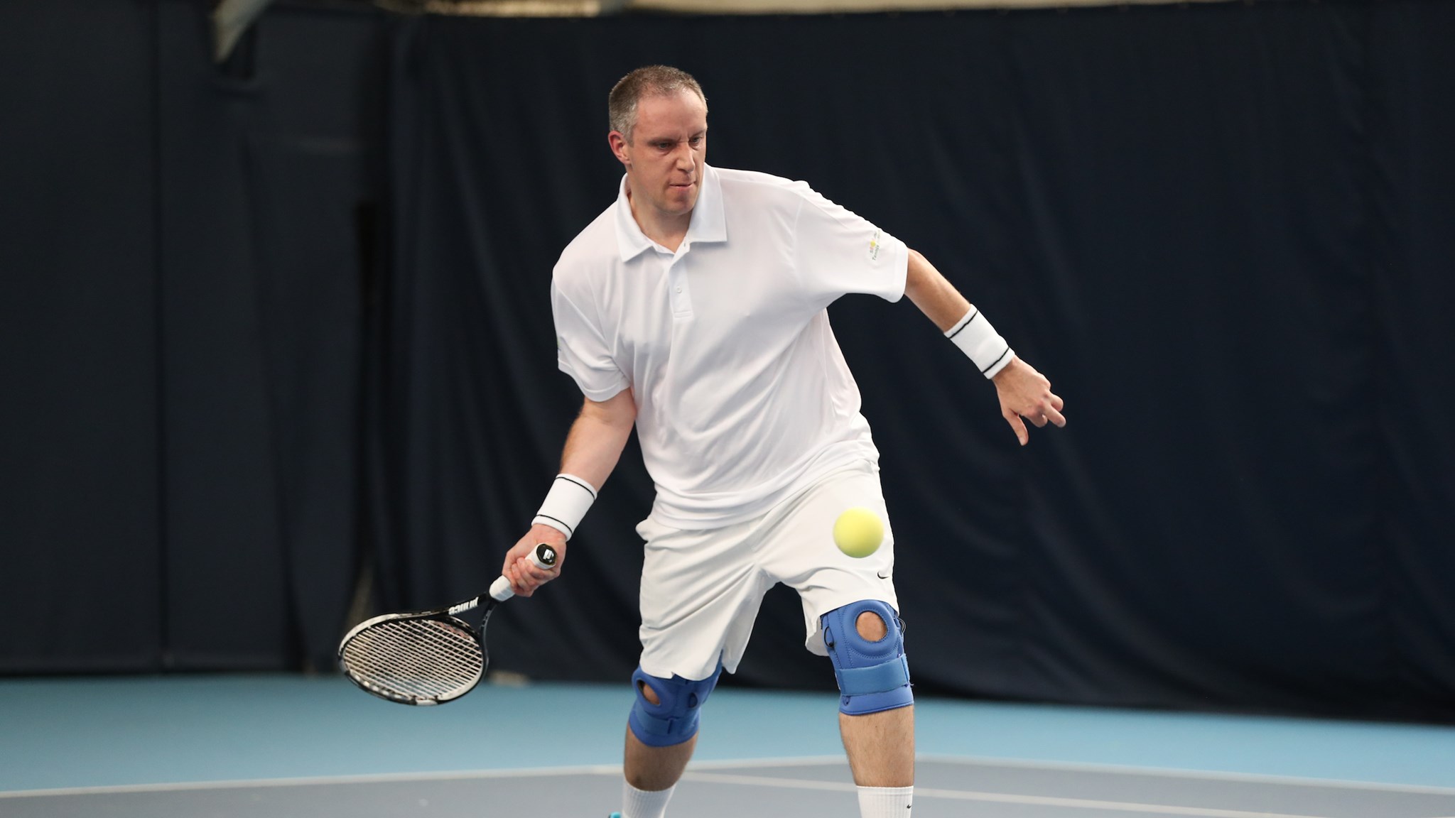 Chris Baily hitting a forehand