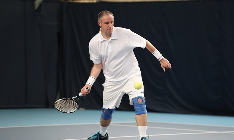 Chris Baily hitting a forehand