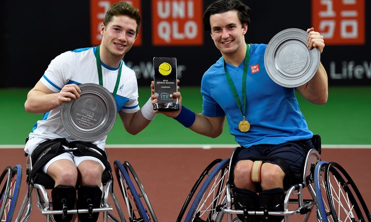 Alfie Hewett and Gordon Reid pose with their Doubles Masters trophies in 2017