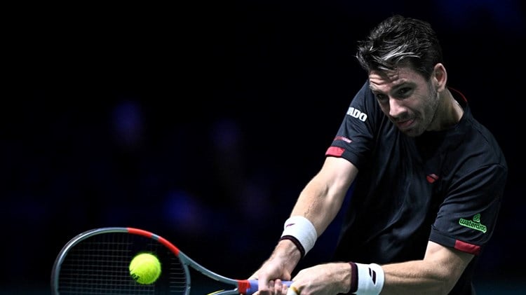 Cam Norrie hits a backhand in the third round of the Rolex Paris Masters 