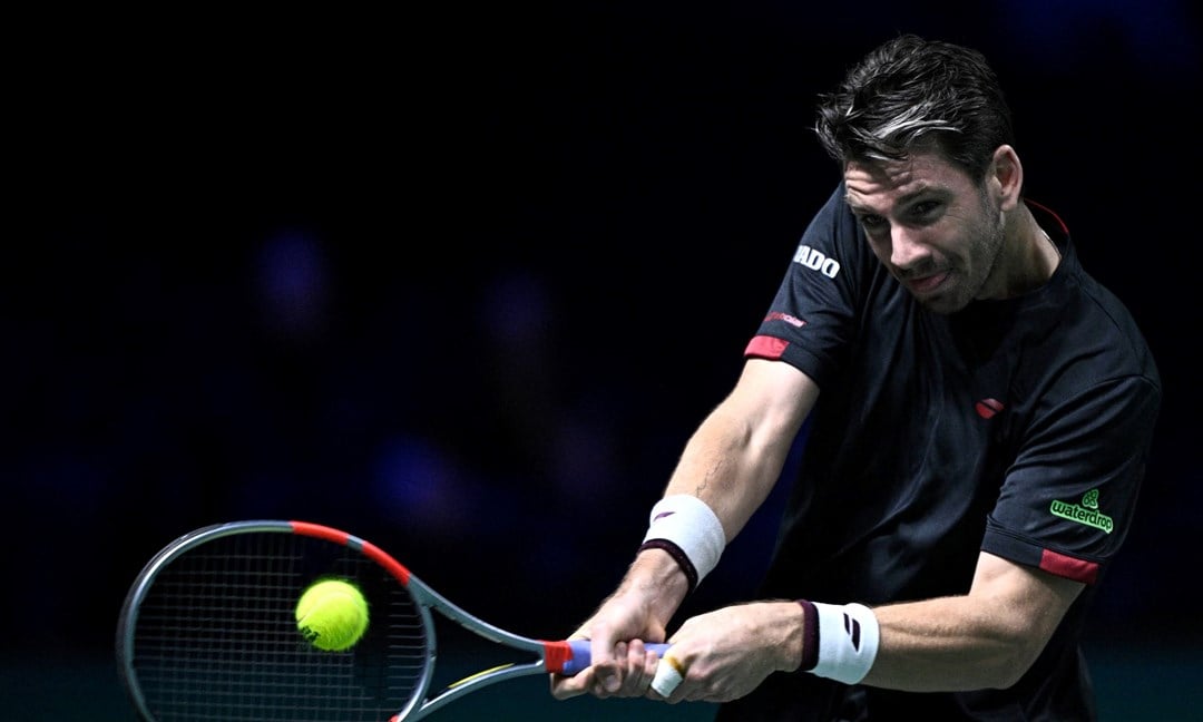 Cam Norrie hits a backhand in the third round of the Rolex Paris Masters 