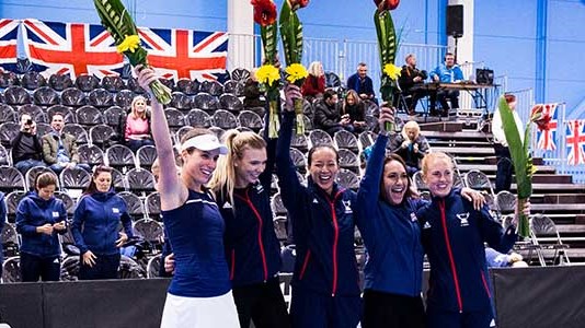 The 2018 GB women's tennis team celebrating at the Fed Cup