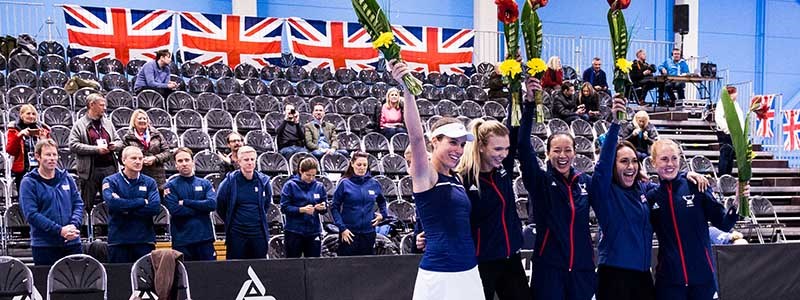 The 2018 GB women's tennis team celebrating at the Fed Cup