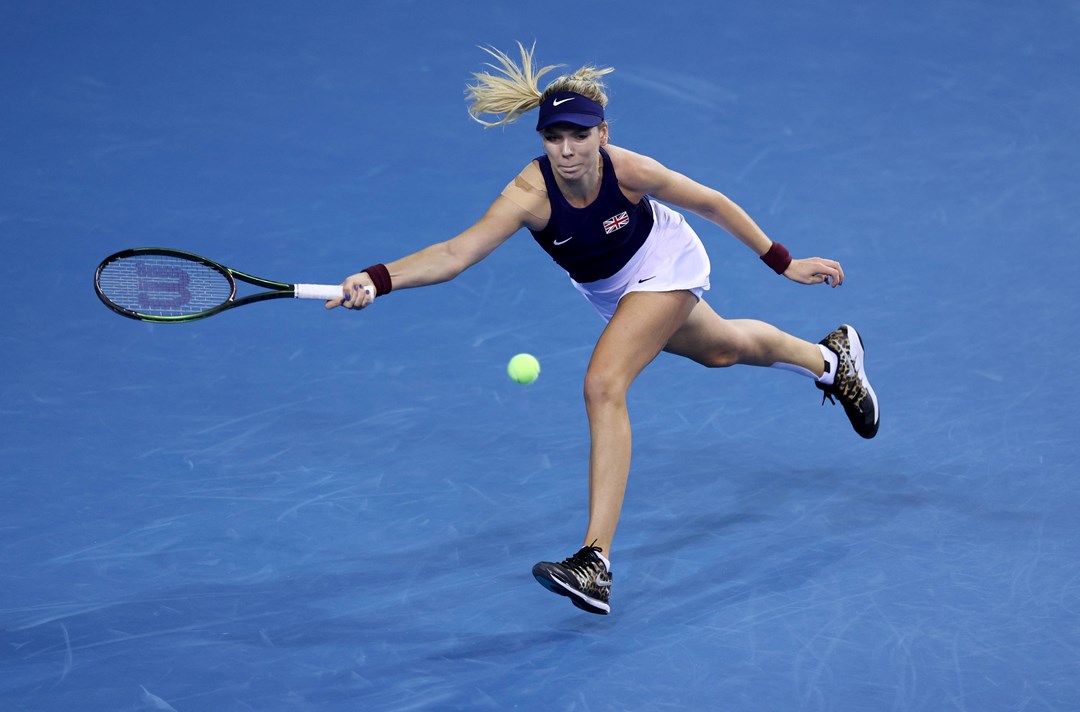 Katie Boulter plays a forehand against Kazakhstan's Yulia Putintseva at the 2022 Billie Jean King Cup at the Emirates Arena, Glasgow