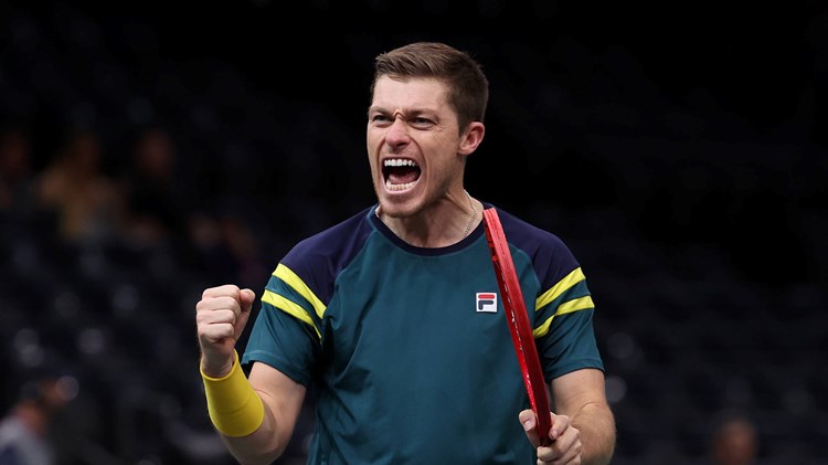 Neal Skupski celebrates winning the semi-final at the Paris Masters