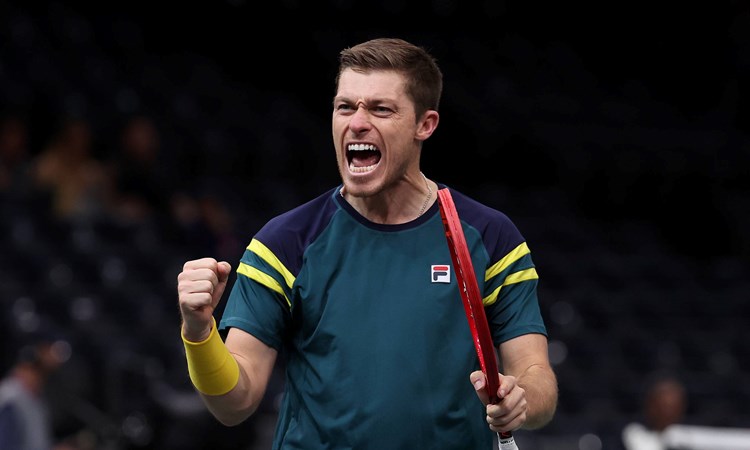 Neal Skupski celebrates winning the semi-final at the Paris Masters