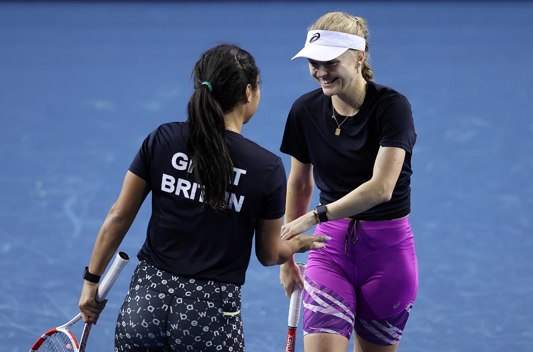 Harriet Dart high fives Heather Watson in training for the Billie Jean King Cup Finals