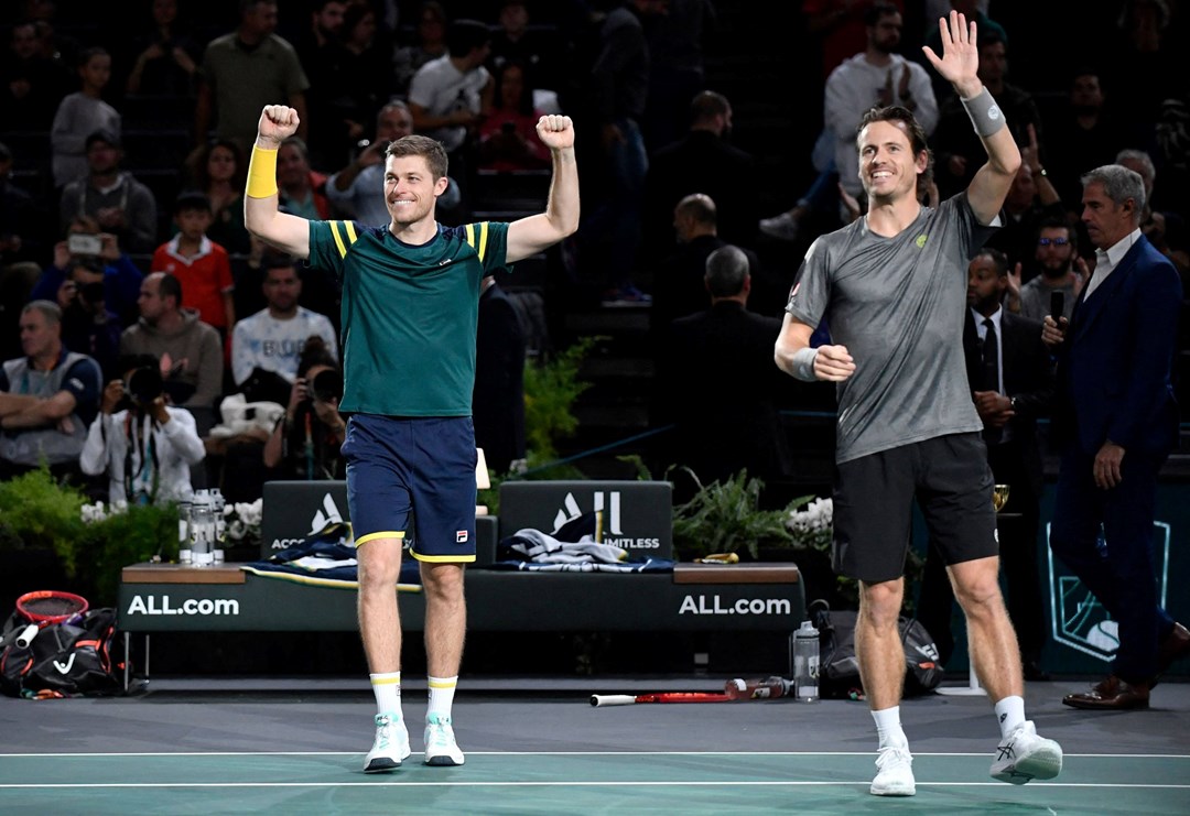 Neal Skupski and Wesley Koolhof celebrate winning the Rolex Paris Masters 2022