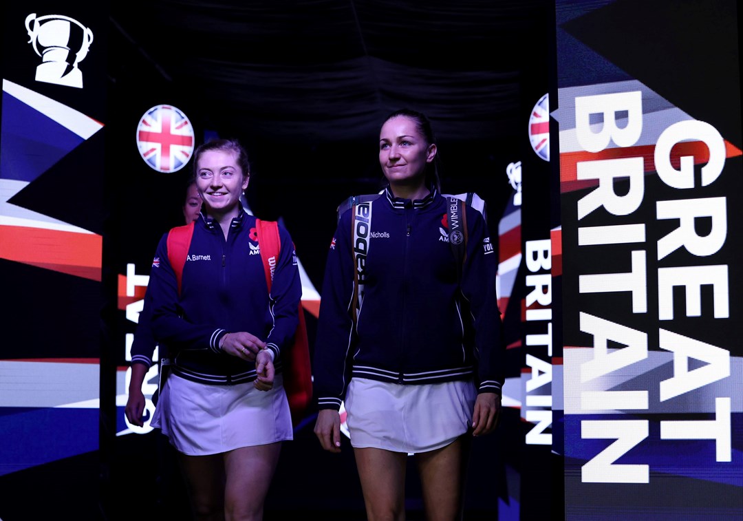 Alicia Barnett and Olivia Nicholls walking onto court ahead of their doubles rubber against Kazakhstan's Elena Rybakina and Anna Danilina at the 2022 Billie Jean King Cup in Glasgow
