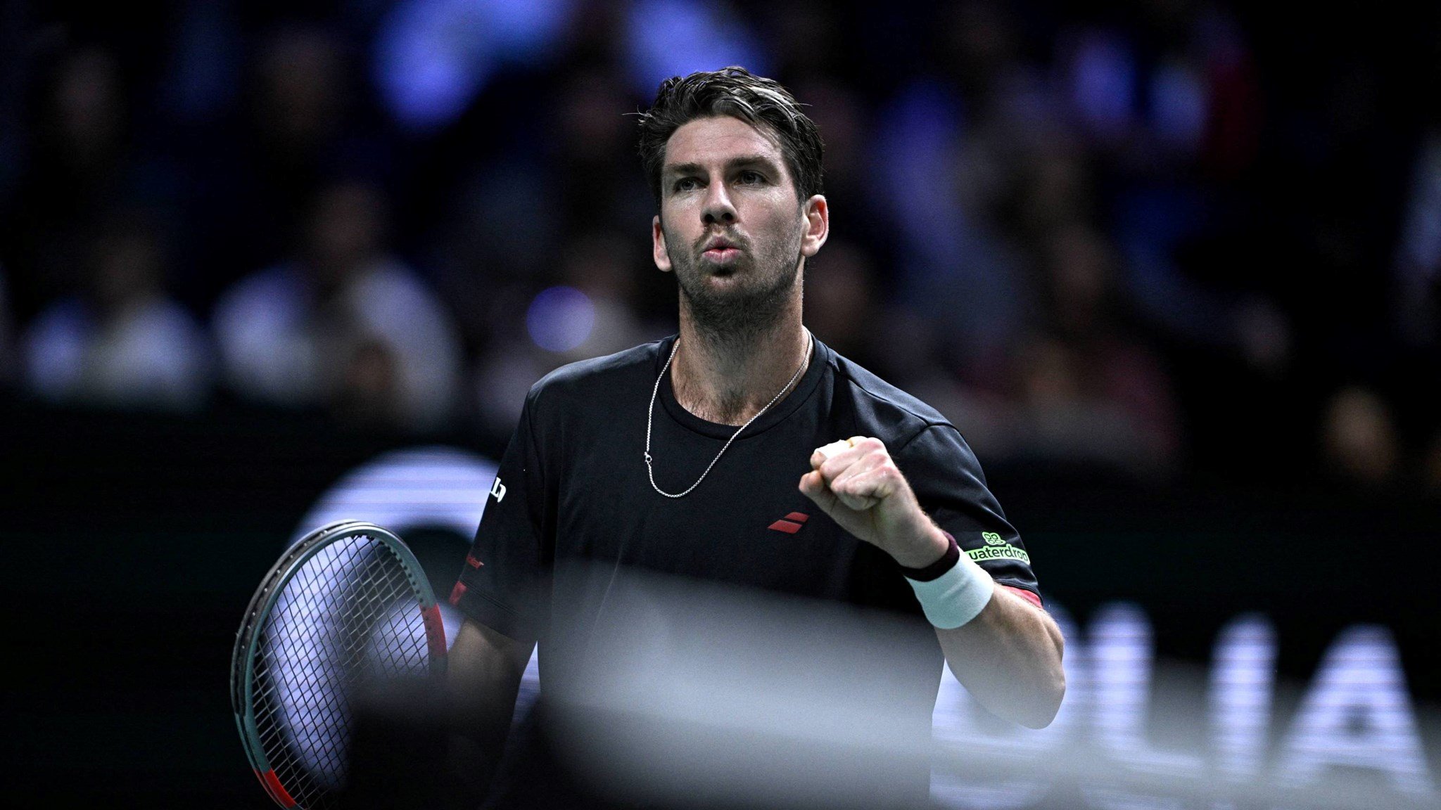 Cam Norrie gives a fist pump in action at the Rolex Paris Masters