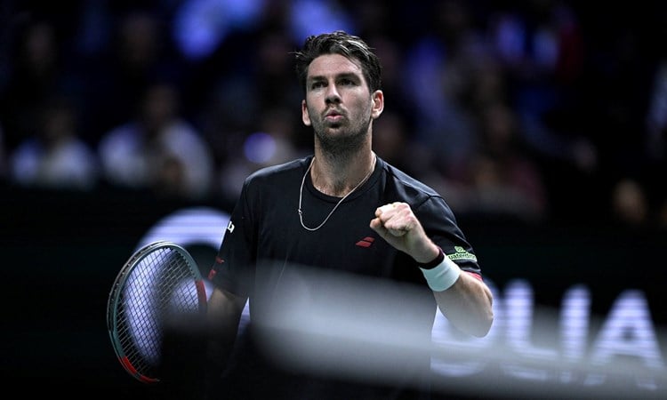 Cam Norrie gives a fist pump in action at the Rolex Paris Masters