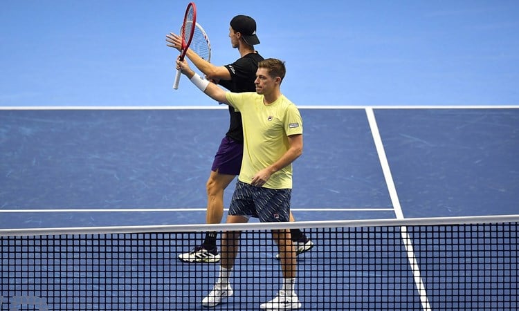 British doubles stars Neal Skupski and Joe Salisbury stood on court at the Nitto ATP Finals