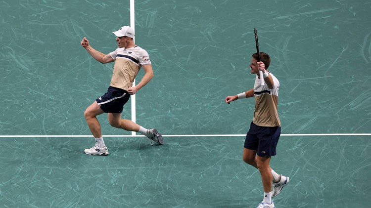 Harri Heliovaara and Henry Patten celebrate winning the Rolex Paris Masters title