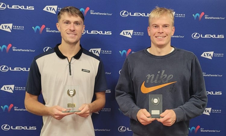 James Story holding the Lexus British Pro Series title next to runner-up Anton Matusevich