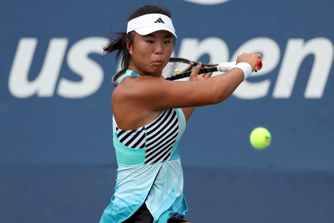 Mingge Xu hits a backhand at the US Open