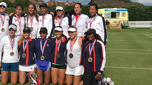 Group of female tennis players together with their medals