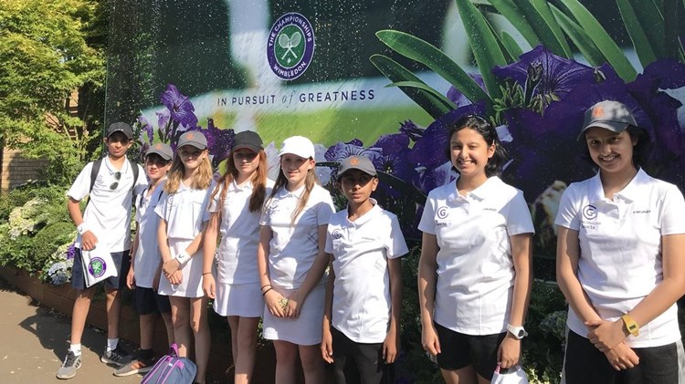 students posing infront of wimbledon