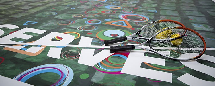 logo of serves with two tennis rackets