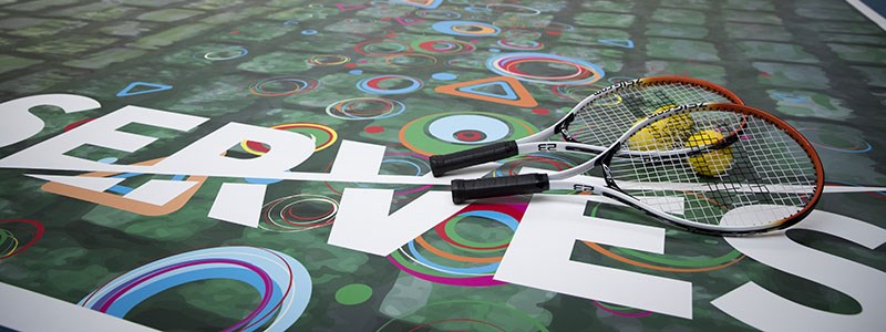 logo of serves with two tennis rackets