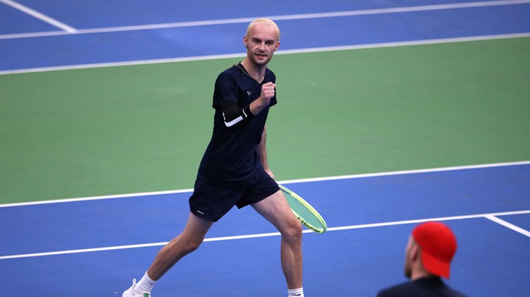 BOLTON, ENGLAND - NOVEMBER 12: Adam Brownsword celebrates during the Learning Disability Tennis National Finals at Bolton Arena on November 12, 2023 in Bolton, England.