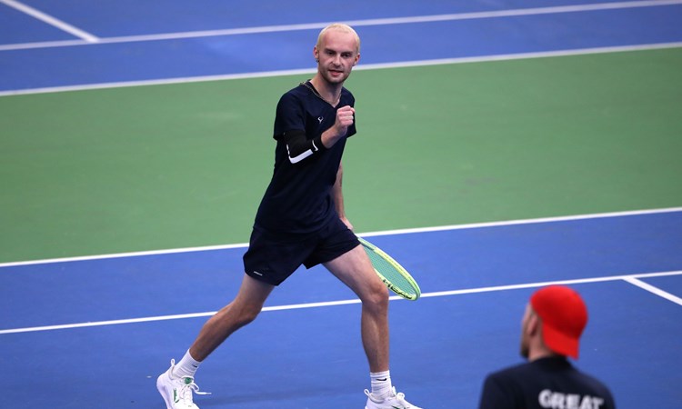 BOLTON, ENGLAND - NOVEMBER 12: Adam Brownsword celebrates during the Learning Disability Tennis National Finals at Bolton Arena on November 12, 2023 in Bolton, England.