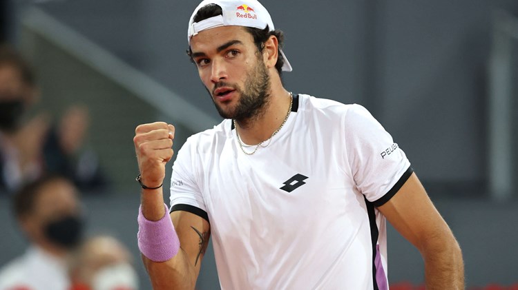 Matteo Berrettini fist pump at a tennis tournament