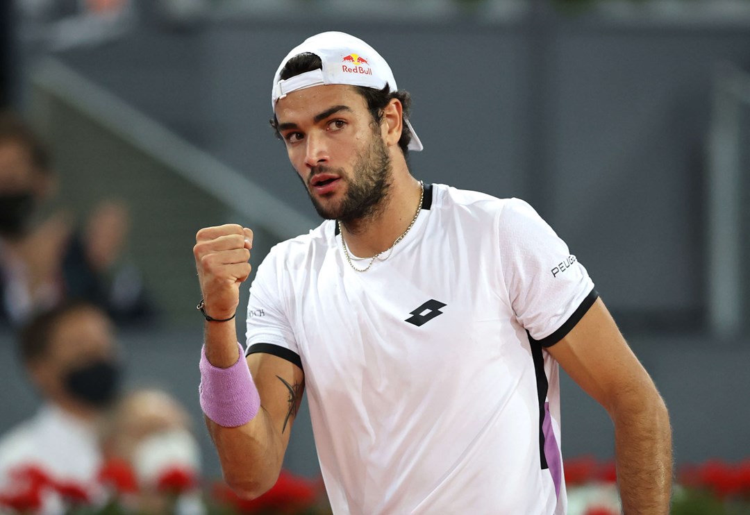 Matteo Berrettini fist pump at a tennis tournament