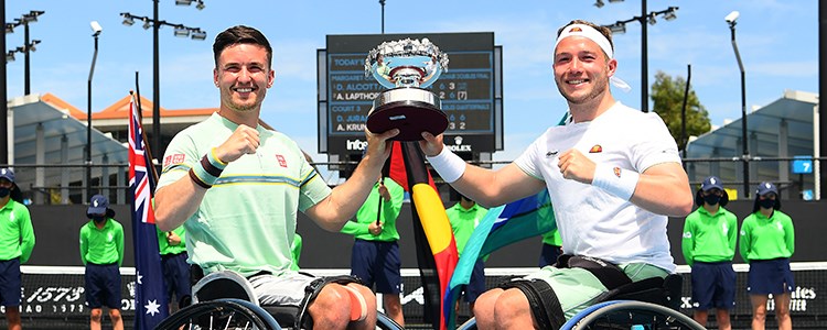 Alfie Hewett and Gordon Reid holding a trophy together