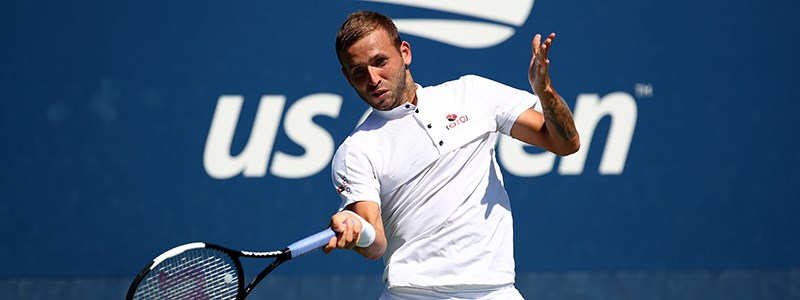 Dan Evans hitting a forehand