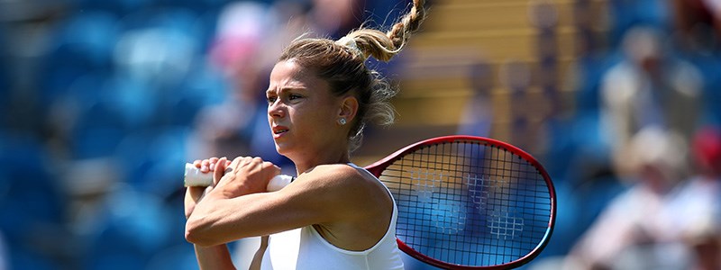 Camila Giorgi after playing a forehand shot in tennis