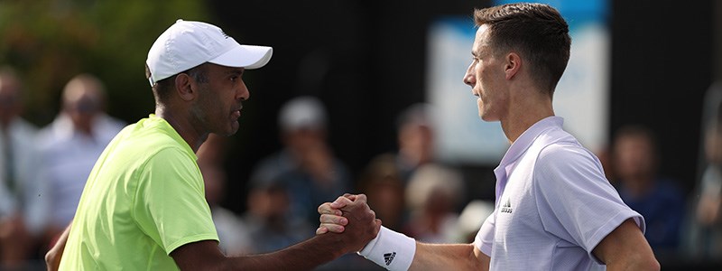 Rajeev Ram and Joe Salisbury shaking hands