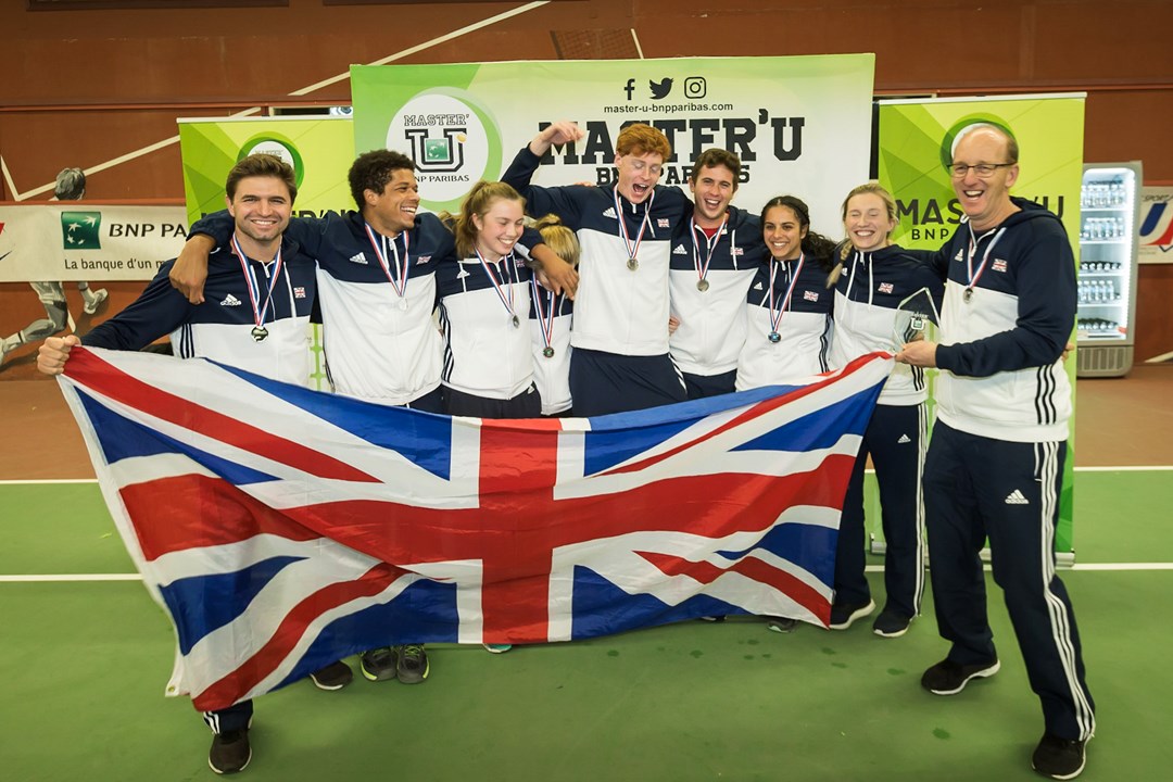 team celebrating with union jack flag