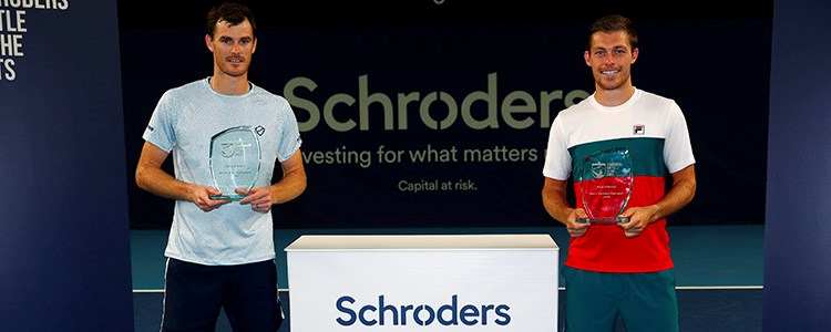 Jamie Murray and Neal Skupski holding their awards